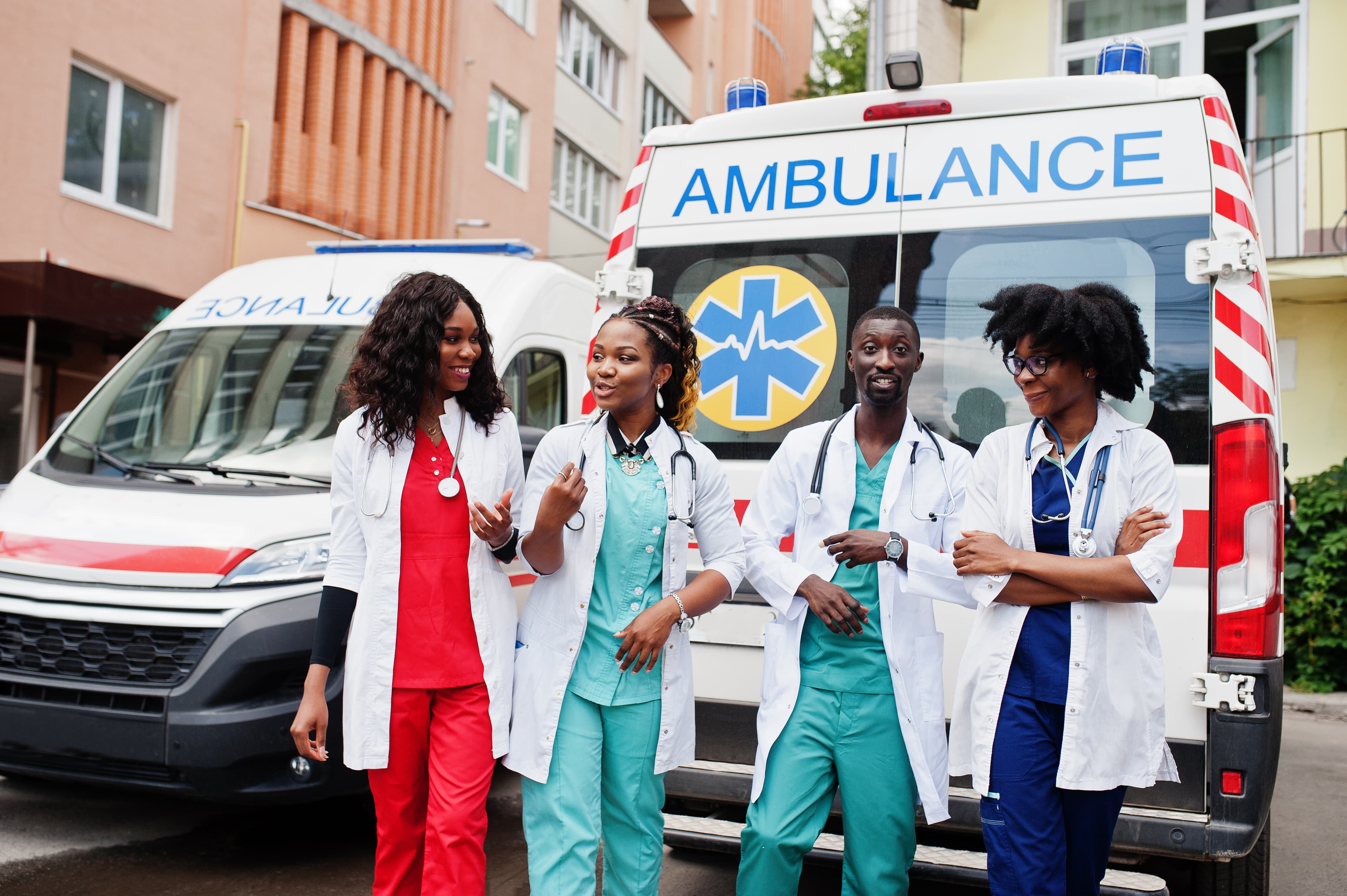 Healthcare workers providing medical care in a community setting
